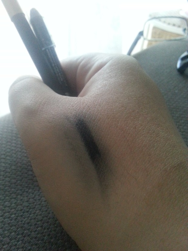 Napoleon liner, on left almost wiped away, while Scandaleyes smudges but totally survives - which is fine BECAUSE I DON'T INTEND ON RUBBING MY EYEBALLS.